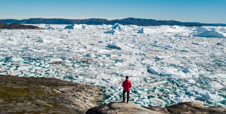 Greenland explorer surveys melting ice