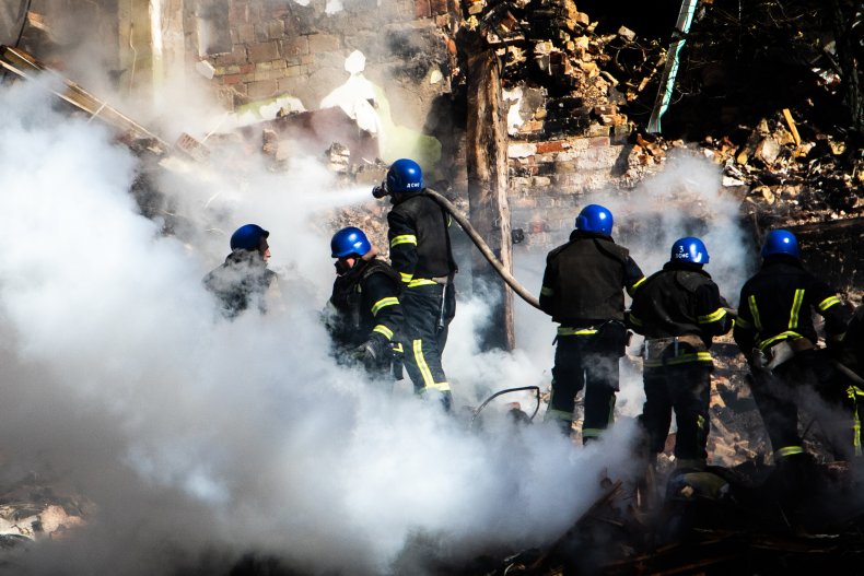 Rescuers sort through rubble