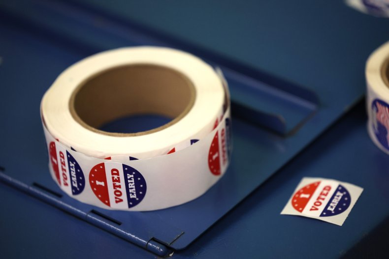 Stickers sit on the ballot box