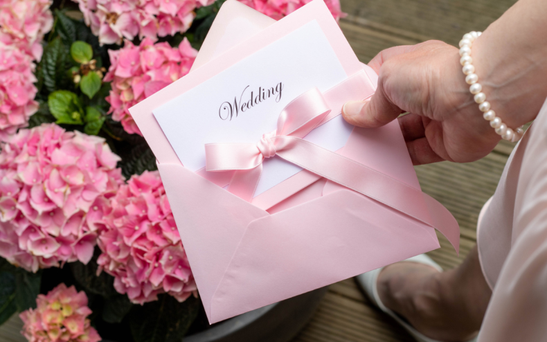 A paper wedding invite.