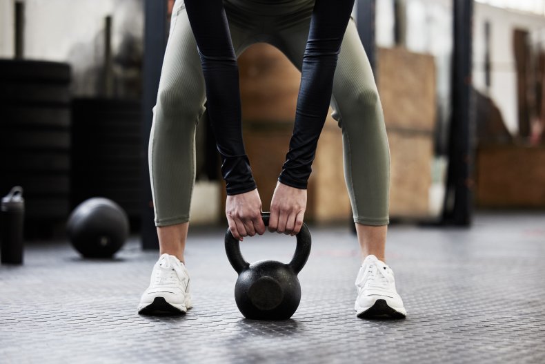 A woman lifting weights