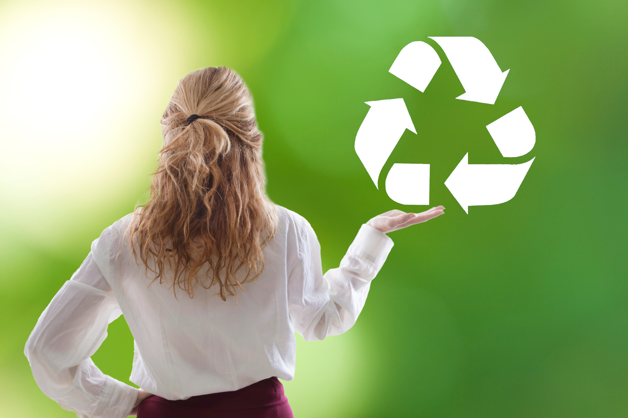 woman with recycling symbol