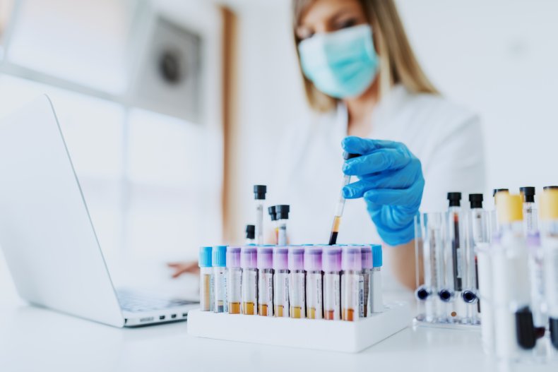 Scientist in lab testing samples
