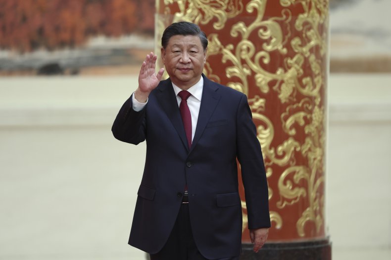 Chinese President Xi Jinping waves during the
