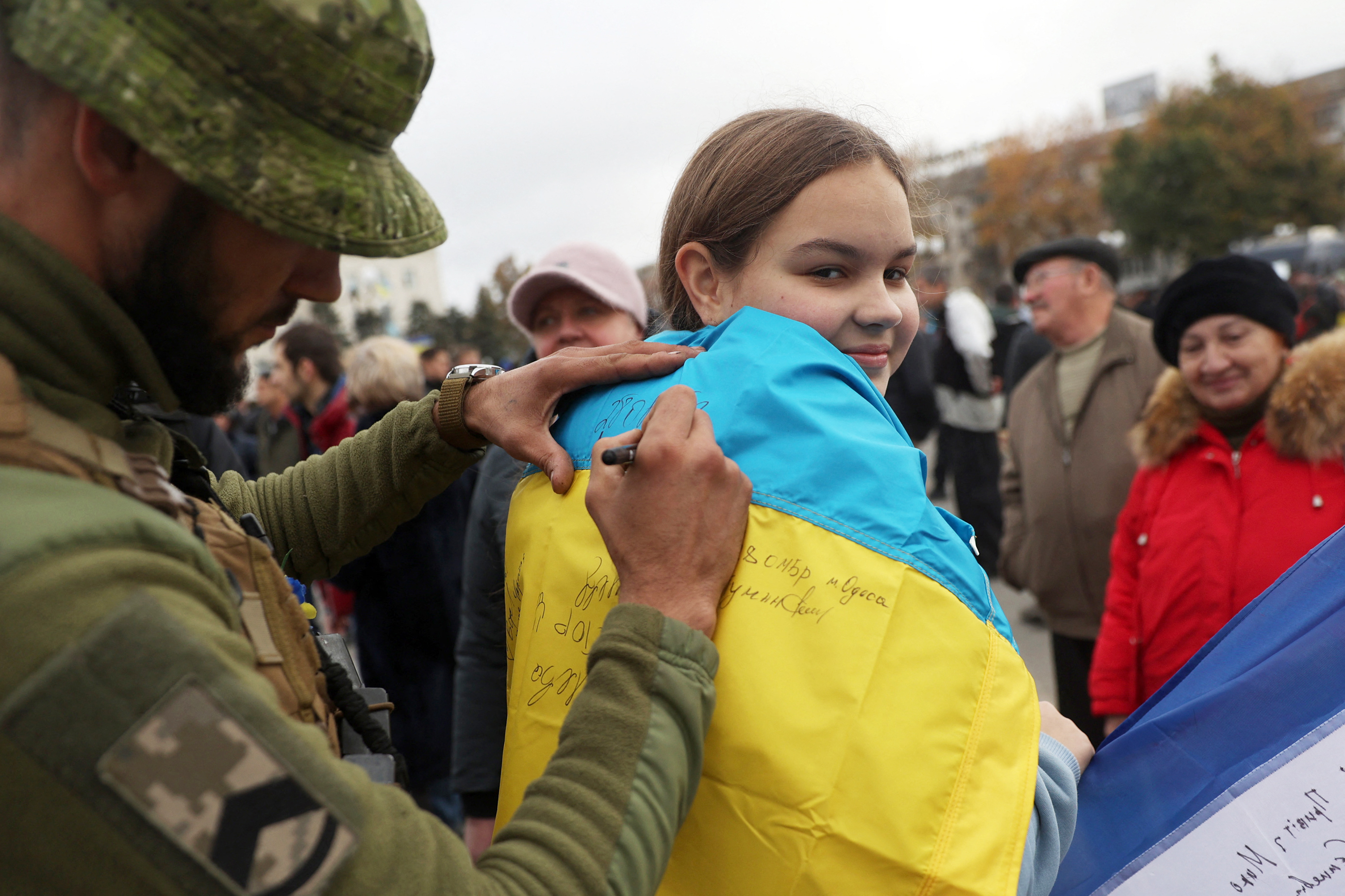 Zelensky Watches Ukraine Flag Raised Over Kherson as Territory Restored