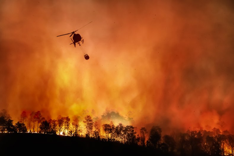 Helicopter putting out wildfire