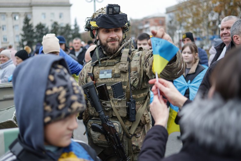 Ukrainian soldier celebrates the liberation of Kherson from Russia