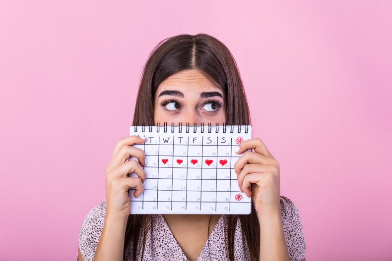 Woman tracking her menstrual cycle