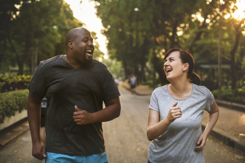 Couple running in park
