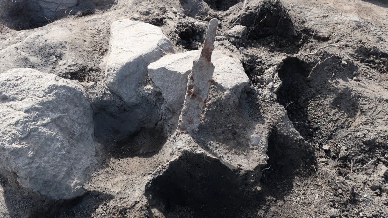 Ancient sword poking out of the ground