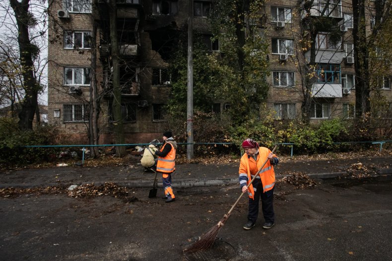 Utility workers clean up territory in Kyiv