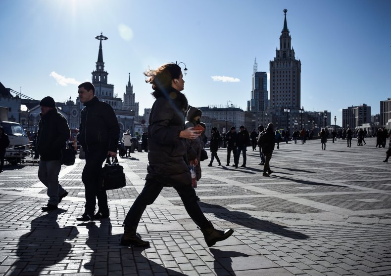 People walk on Komsomolskaya Square in Moscow