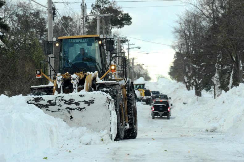 Machinery Clears Heavy Snow From Road