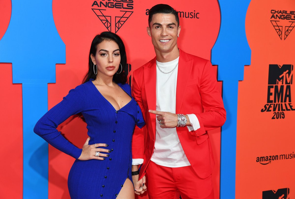 Georgina Rodriguez and Cristiano Ronaldo posing
