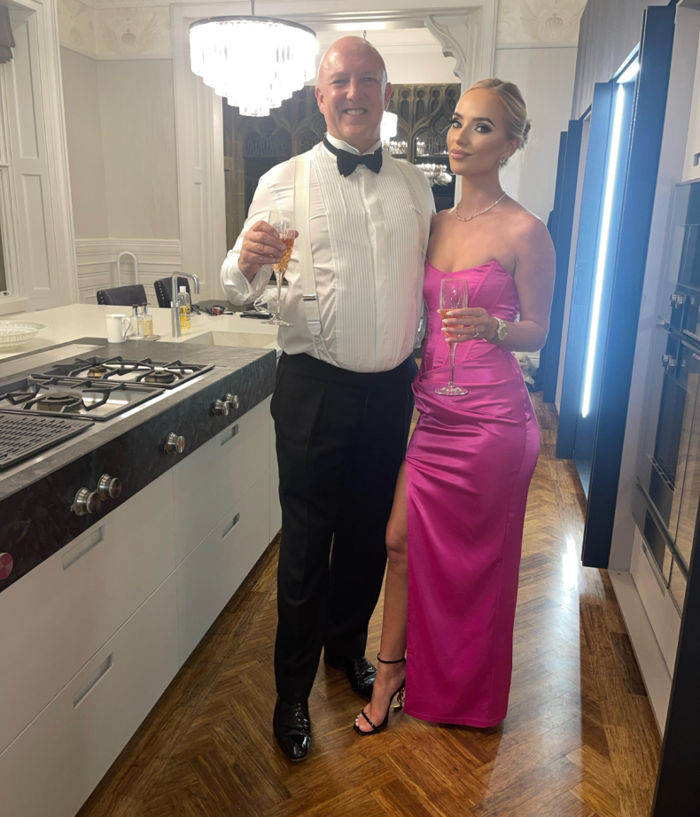 Allana Luke and Jeff Winn drink champagne
