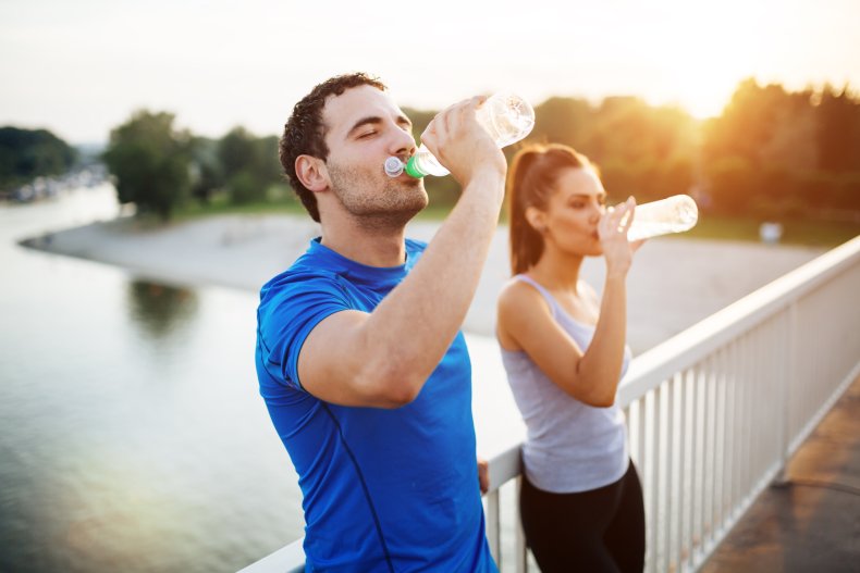 Man and woman drinking water