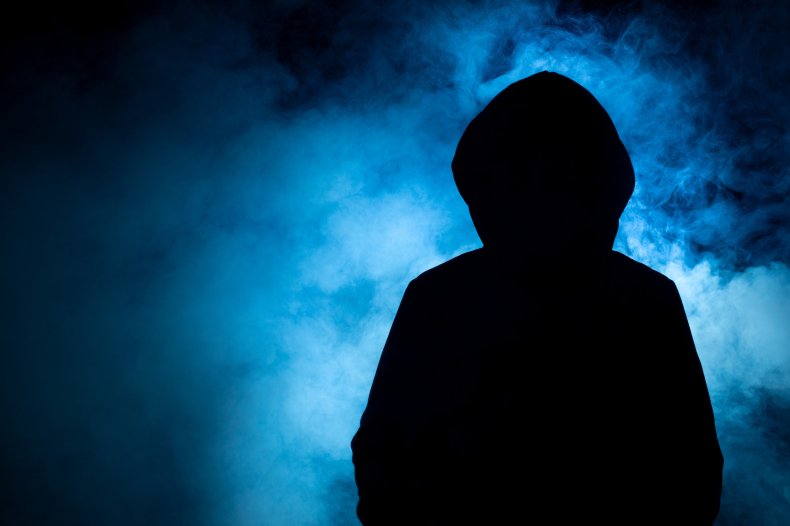 unknown crime suspect hooded figure fog
