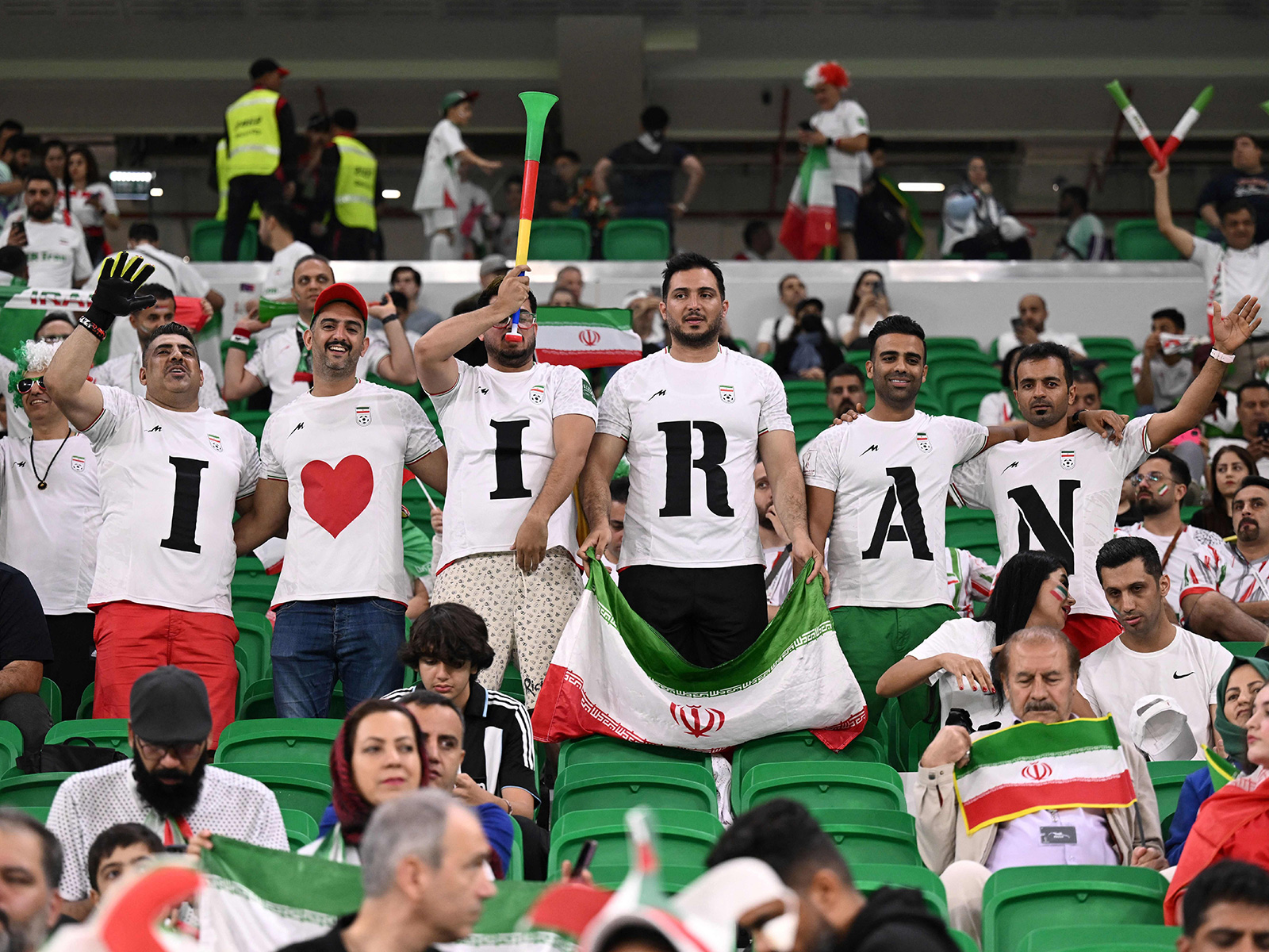 Iranian Fan Wearing Pro-Protest Shirt Attacked in Qatar, Video Shows