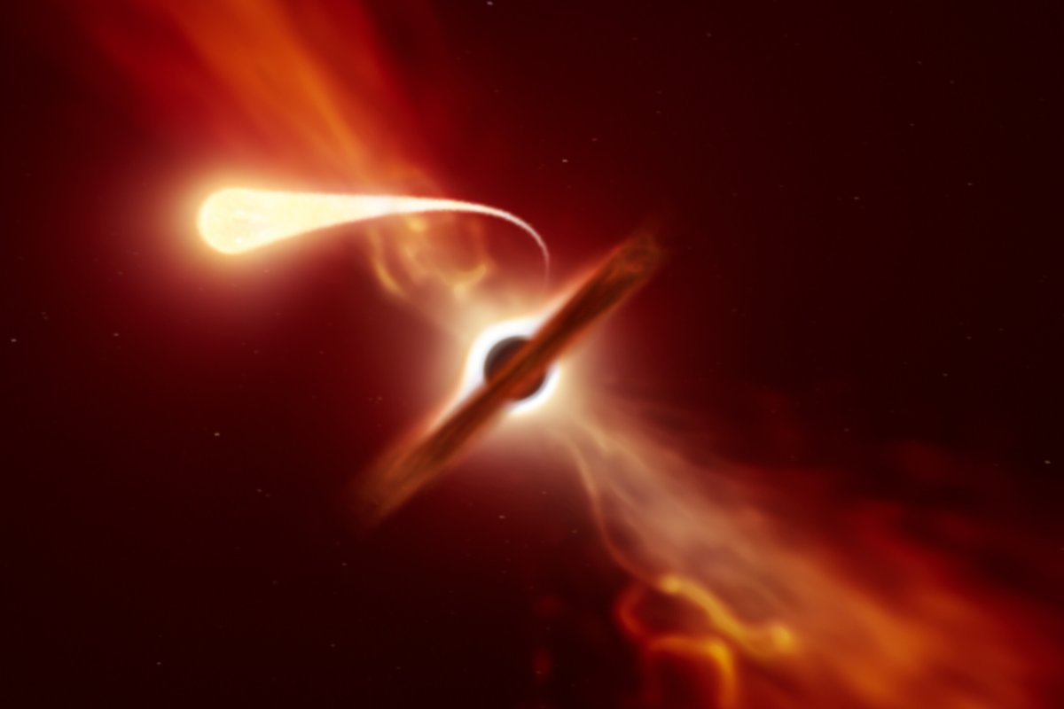 A supermassive black hole devouring a star