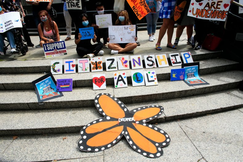 People take part in a protest in support of DACA