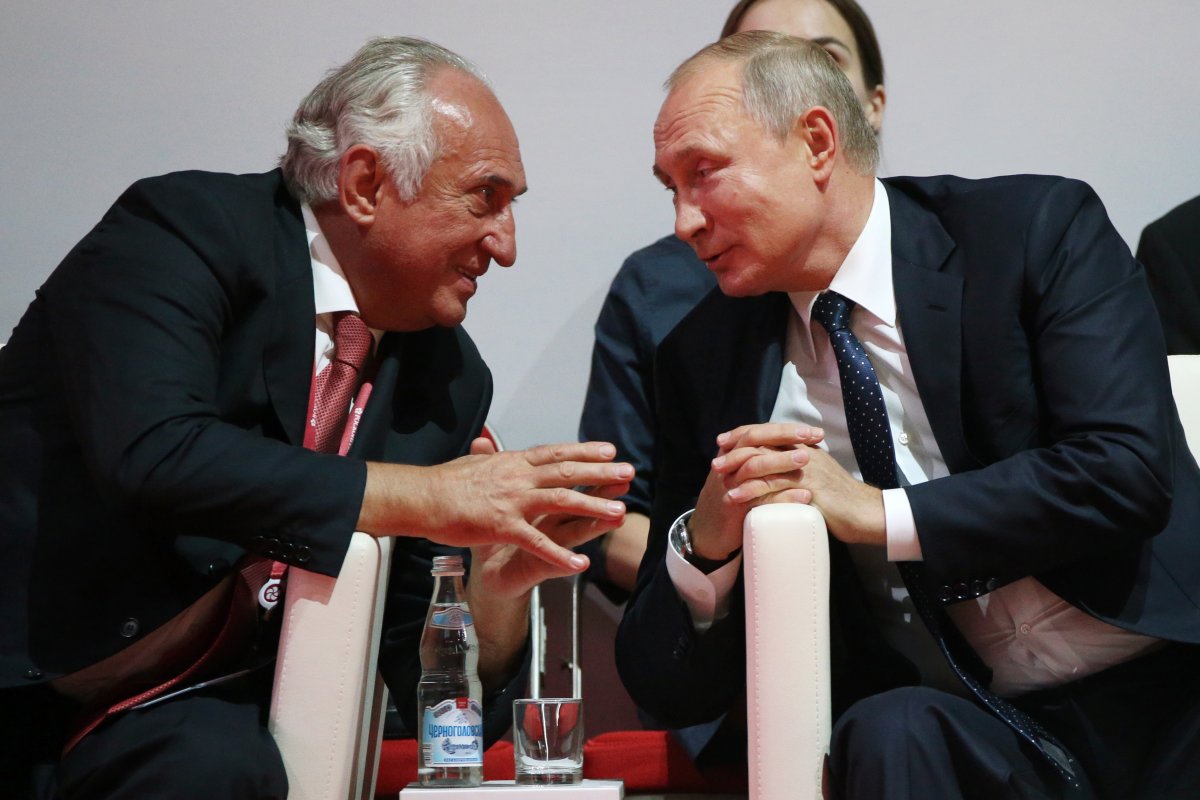 Russian President Vladimir Putin and Vasily Anisimov