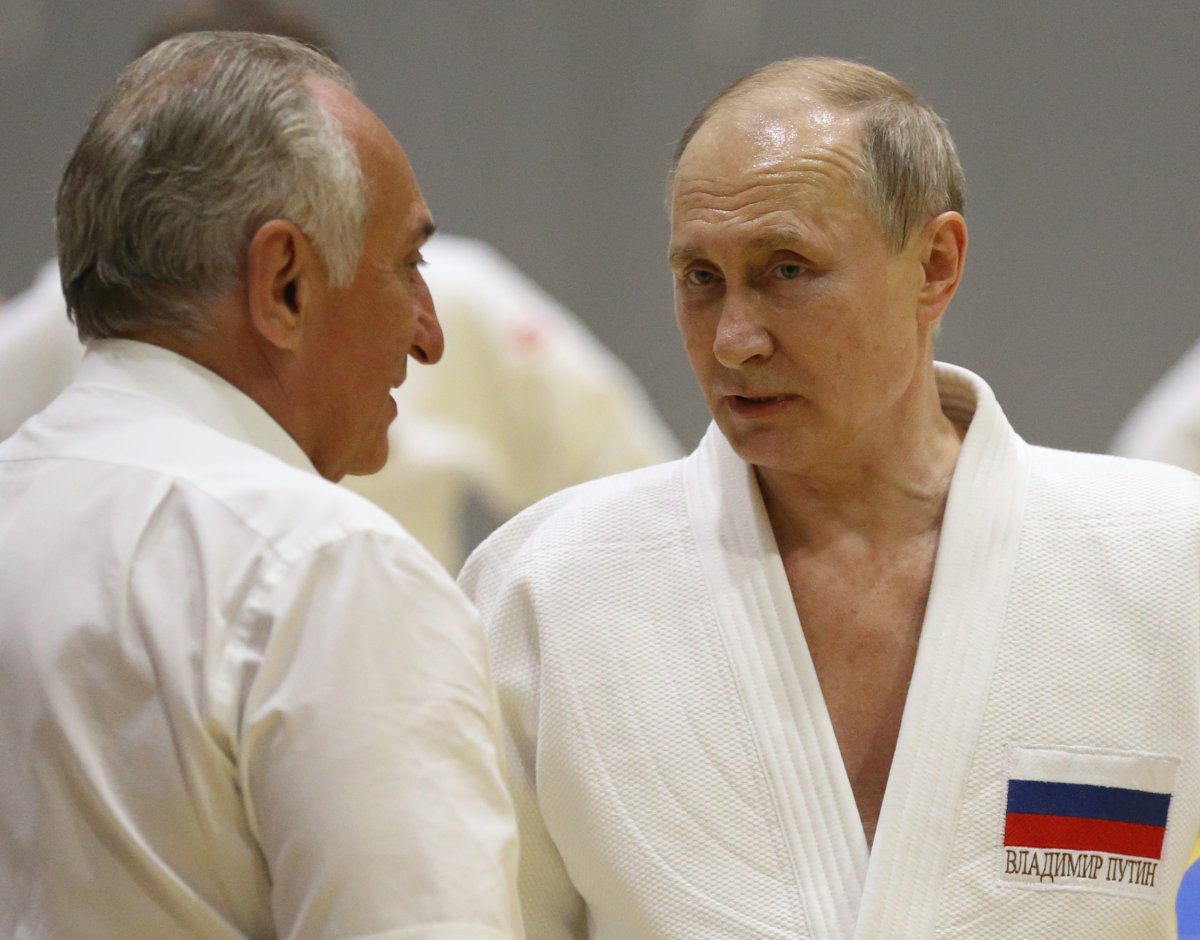 Russian President Vladimir Putin and Vasily Anisimov