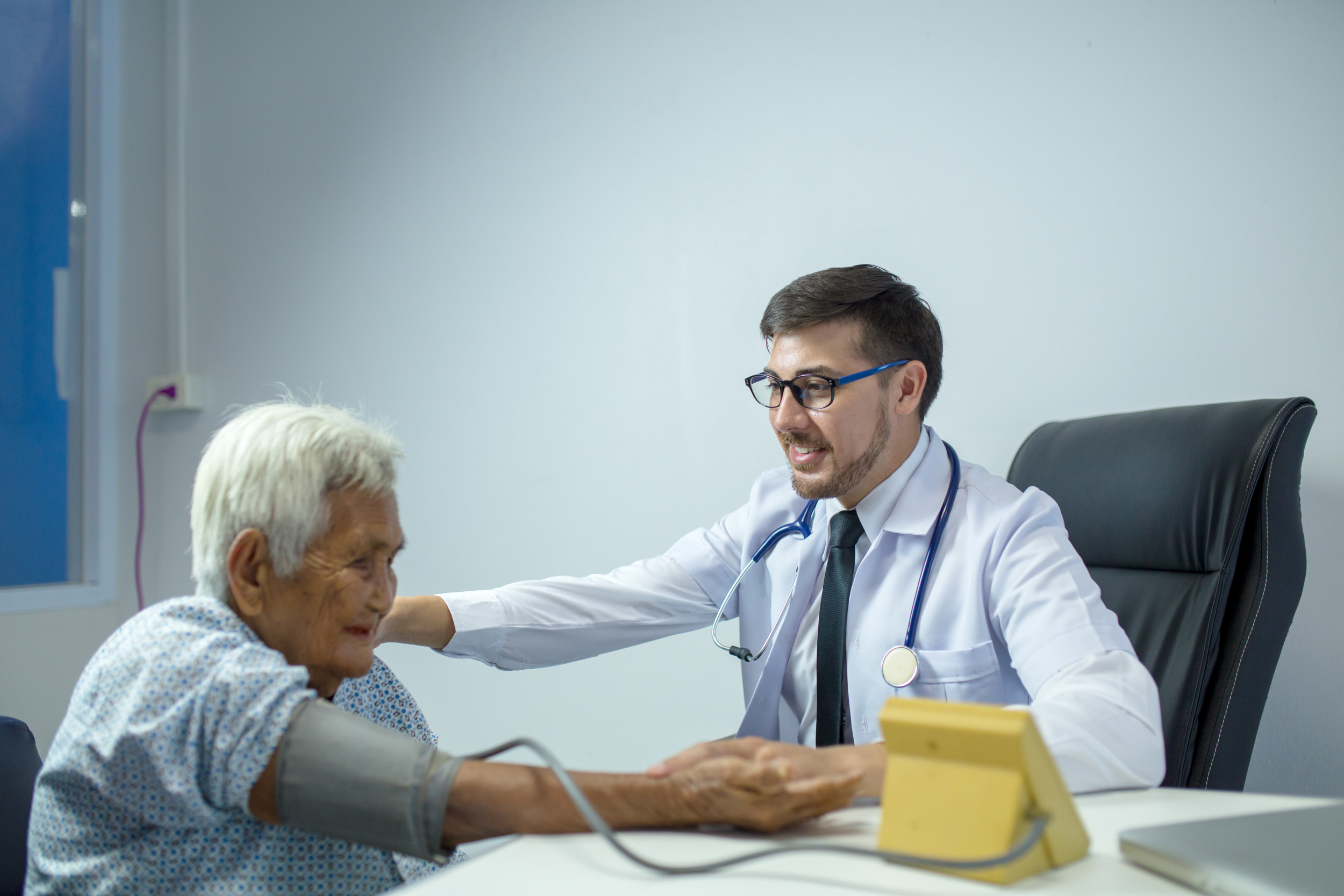 Doctor performs physical examination