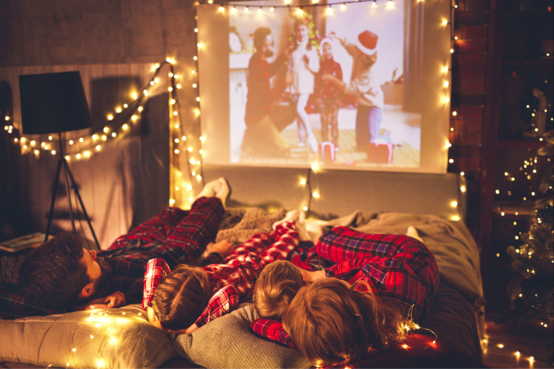 Family watching festive movie