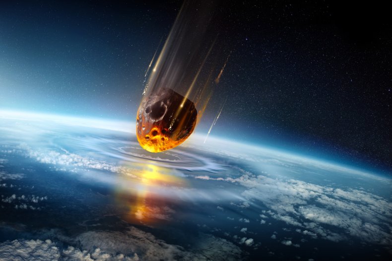 An asteroid colliding with Earth