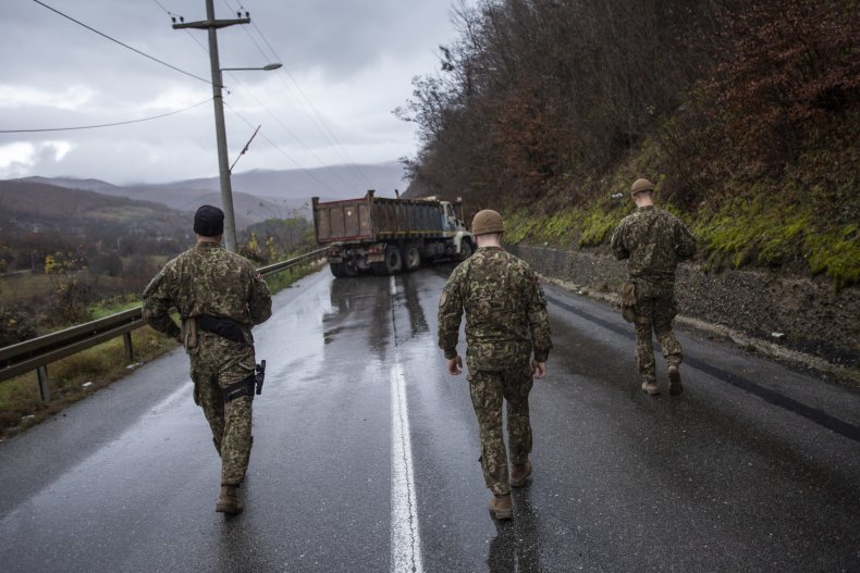 NATO, soldiers, patrol, roadblock, Kosovo, amid, tensions