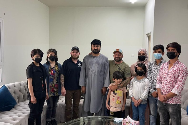 Chad Robichaux with Aziz's family