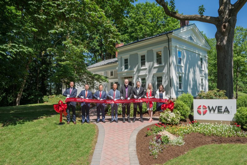 Olivet members at a WEA ribbon cutting