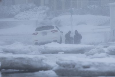 SUV gets stuck in winter storm