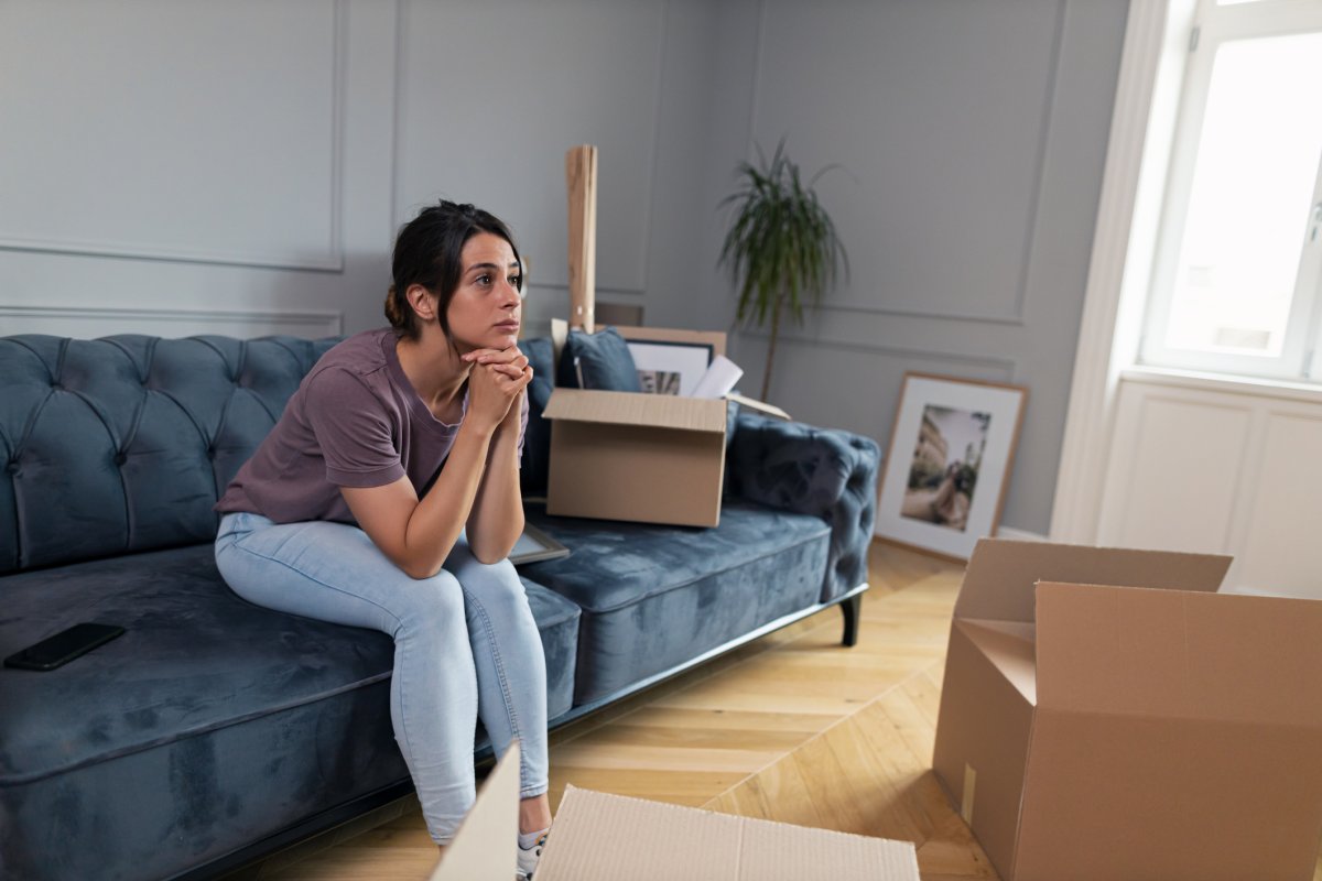 Woman moving out of apartment