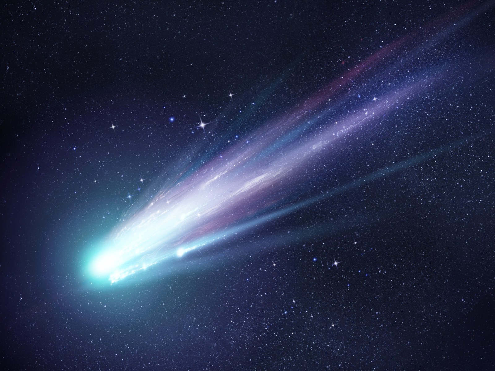 What Makes the Green Comet Green?