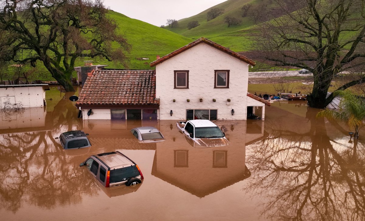 flooded house and cars