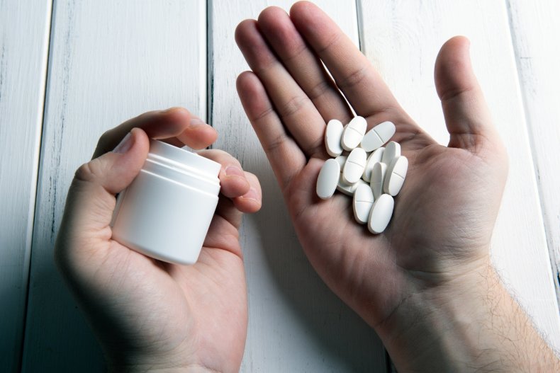 Person holding tablets