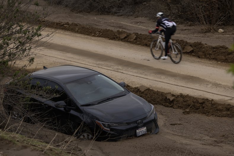 Car stuck in California mud storms