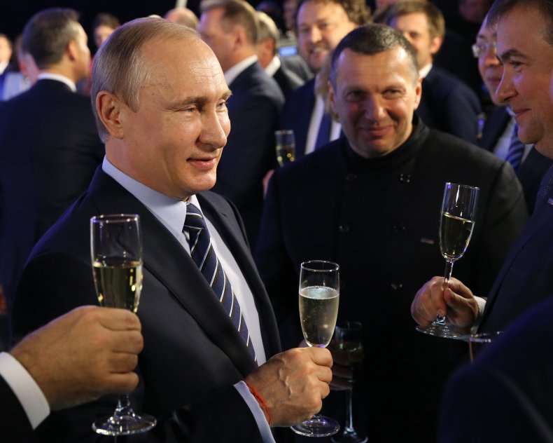 Russian President Vladimir Putin and Vladimir Solovyov