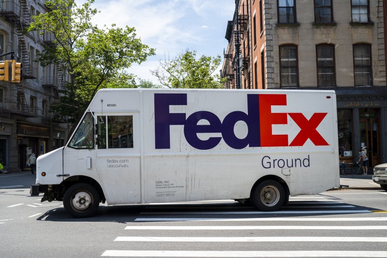 A FedEx truck drives through New York