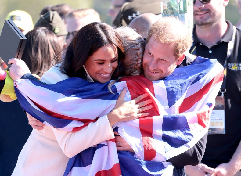 Harry and Meghan Hugg Invictus Games Competitor