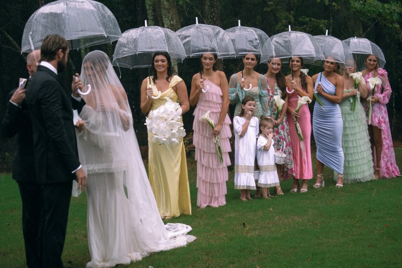Bride with her bridesmaids in the rain