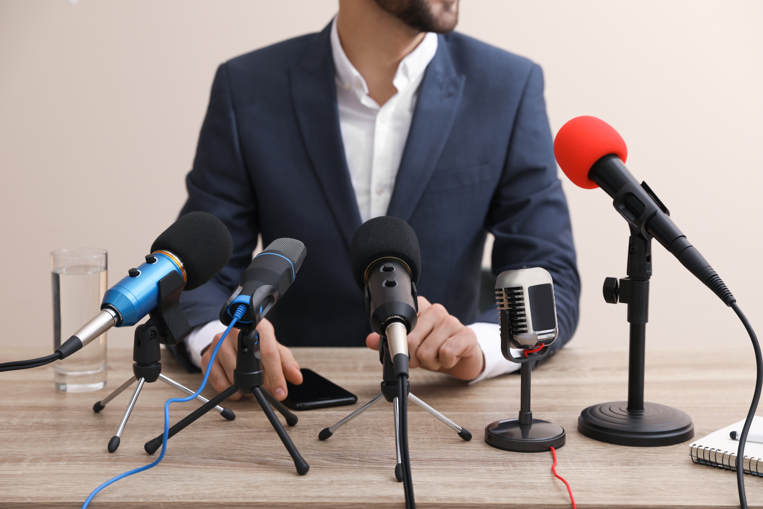 person giving press conference