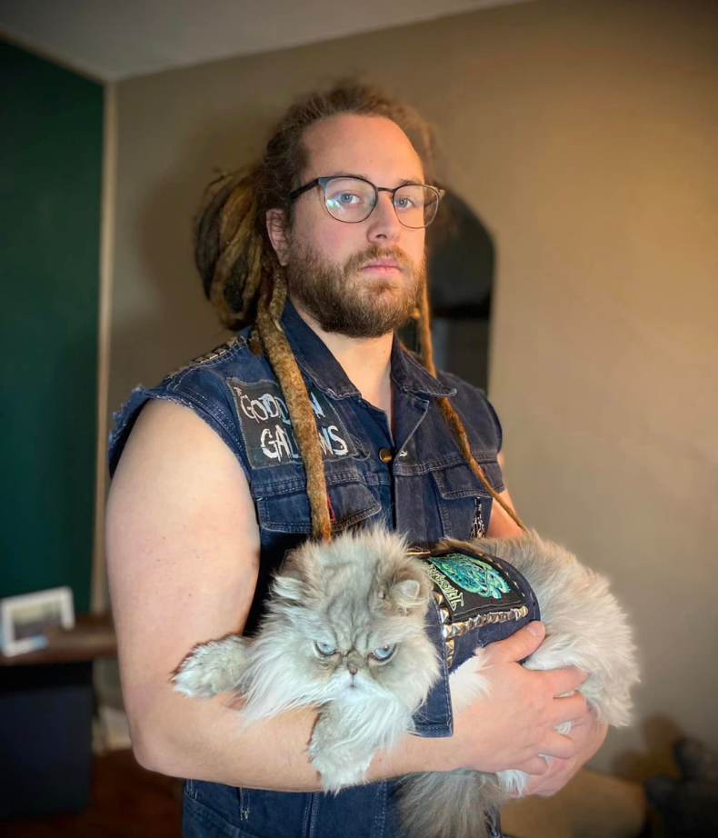 Travis and Persian Mamie in matching vests