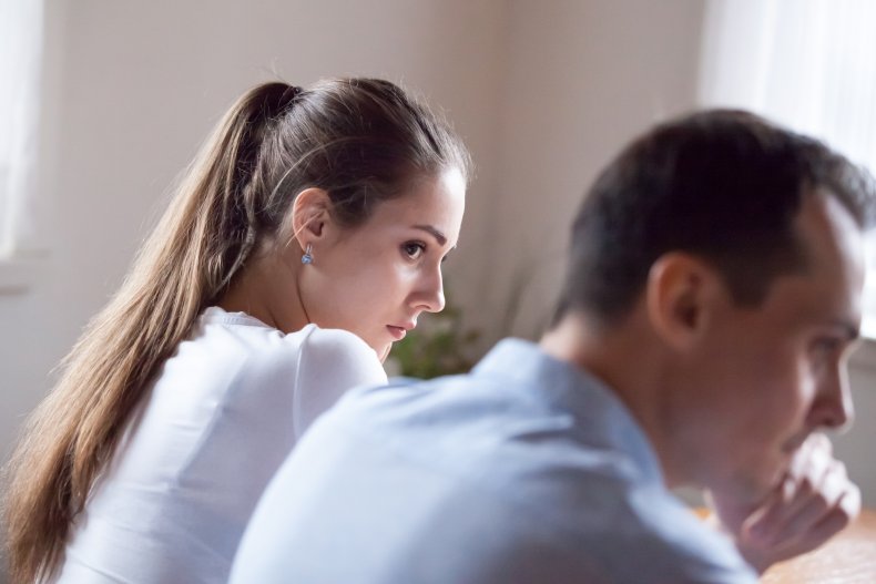 Woman looking sideways at her husband