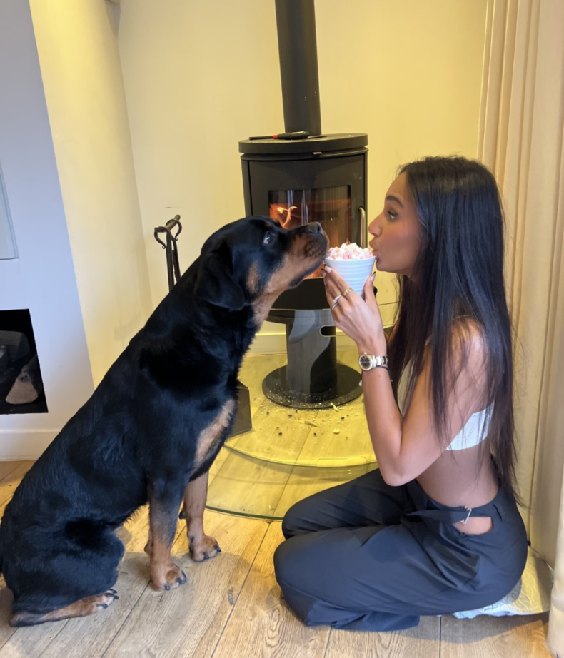 Rottweiler Nala trying to steal owner's drink