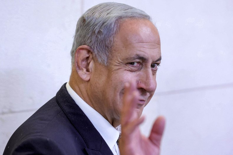 Israeli Prime Minister Benjamin Netanyahu waving as