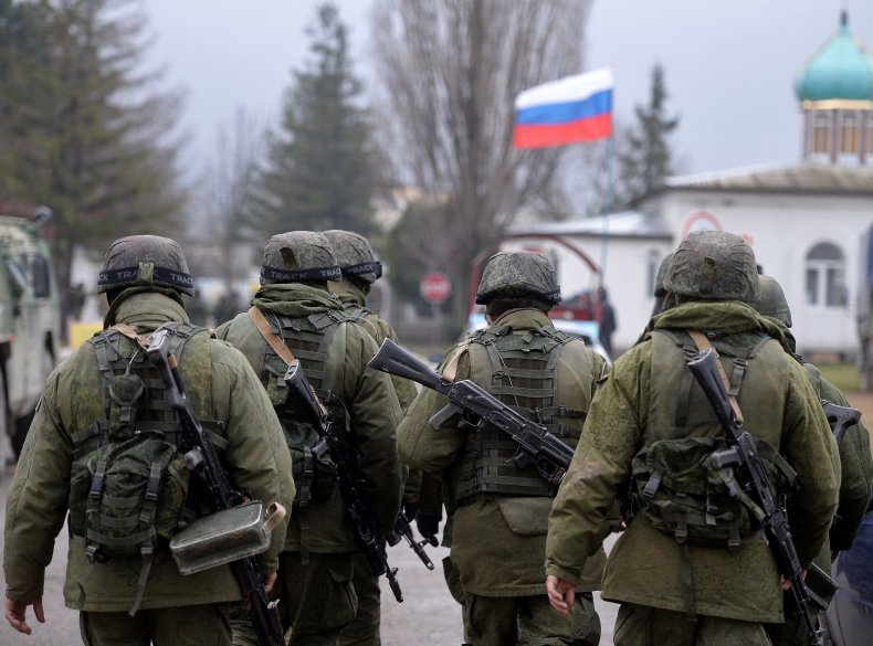 Russian soldiers patrol the area in Crimea