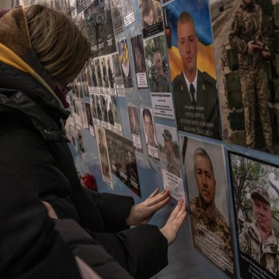Mourner at Memorial Wall Kyiv Mourner at Memorial Wall Kyiv