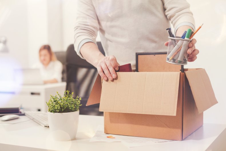 Office worker packing up his desk